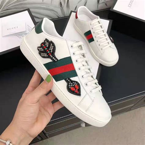 gucci embroidered arrow sneakers|Gucci women's sneakers.